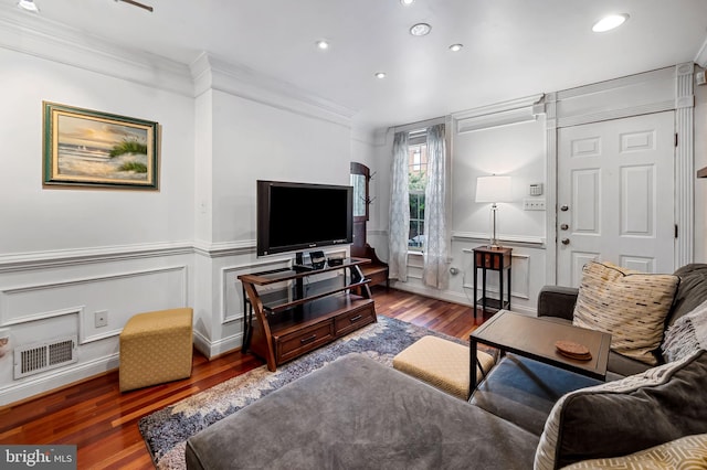 3310 Hudson St, Baltimore, MD 21224 - living room with wood finished floors, crown molding, recessed lighting, and wainscoting