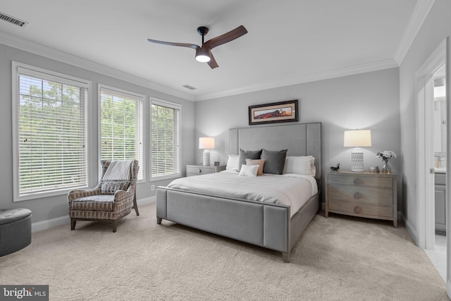 8820 Shining Oceans Way Unit 407, Columbia, MD 21045 - carpeted bedroom with ornamental molding, multiple windows, a ceiling fan, and ensuite bath
