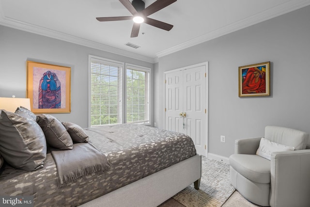 8820 Shining Oceans Way Unit 407, Columbia, MD 21045 - carpeted bedroom featuring crown molding, a closet, and a ceiling fan