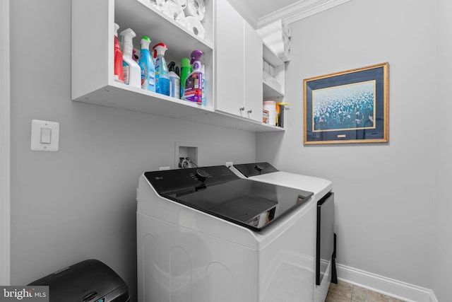 8820 Shining Oceans Way Unit 407, Columbia, MD 21045 - washroom with cabinet space and washing machine and dryer