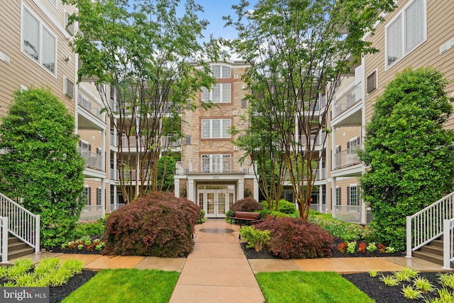 8820 Shining Oceans Way Unit 407, Columbia, MD 21045 - view of apartment building / complex with stairway