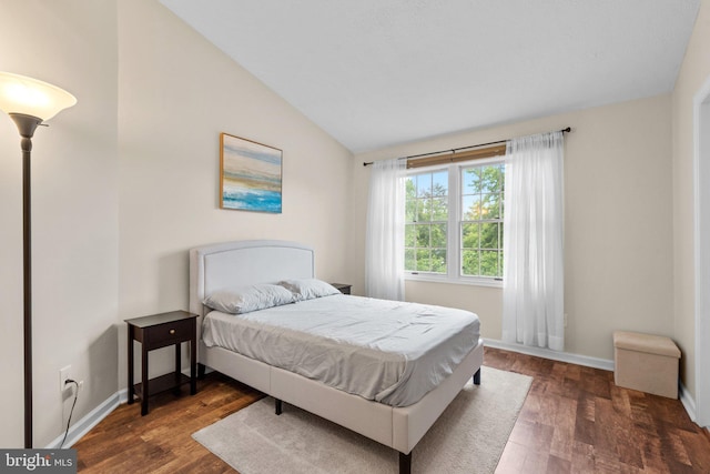 1328 Hollow Glen Ct, Curtis Bay, MD 21226 - bedroom featuring lofted ceiling, wood finished floors, and baseboards