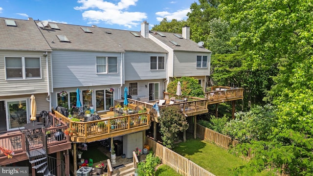 1328 Hollow Glen Ct, Curtis Bay, MD 21226 - rear view of house with a wooden deck, a chimney, and stairway