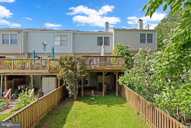 1328 Hollow Glen Ct, Curtis Bay, MD 21226 - back of property with a deck and a chimney