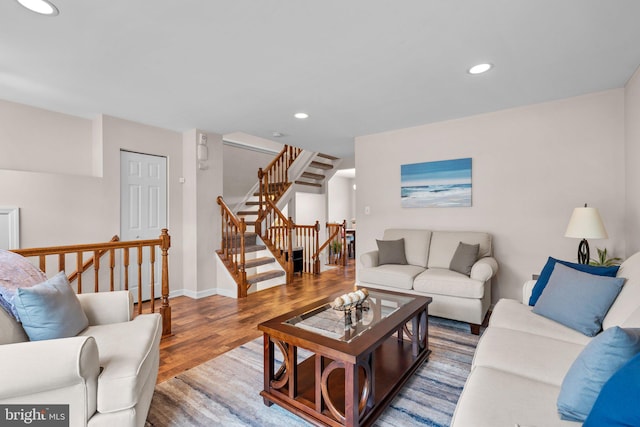 1328 Hollow Glen Ct, Curtis Bay, MD 21226 - living room with wood finished floors, recessed lighting, stairway, and baseboards