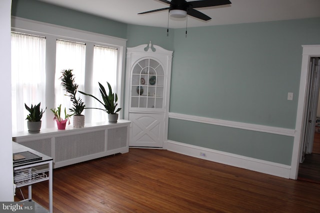 527 N 25th St, Reading, PA 19606 - empty room with a ceiling fan, wood finished floors, radiator heating unit, and baseboards