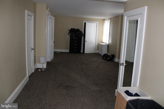 527 N 25th St, Reading, PA 19606 - hall with baseboards and carpet floors