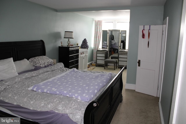 527 N 25th St, Reading, PA 19606 - carpeted bedroom featuring baseboards