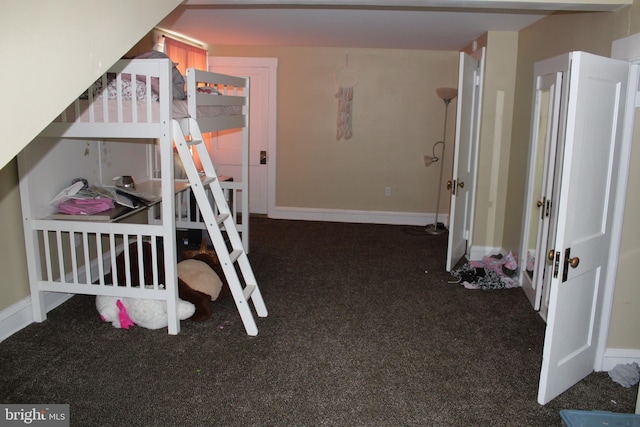 527 N 25th St, Reading, PA 19606 - bedroom with carpet floors and baseboards