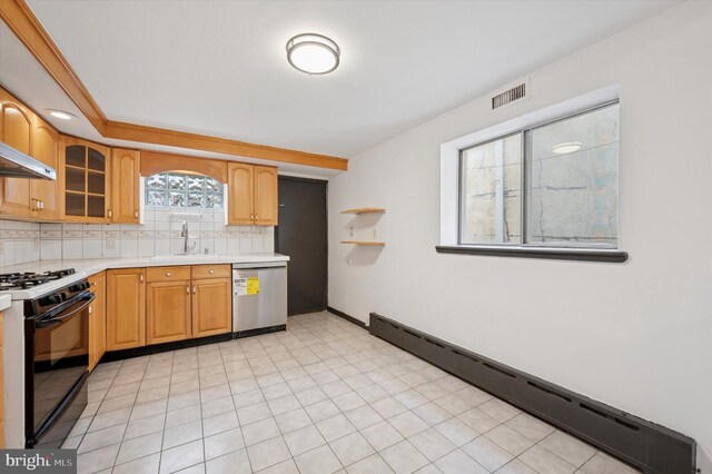 913 Tasker St, Philadelphia, PA 19148 - kitchen with dishwasher, gas stove, a baseboard radiator, a sink, and light countertops