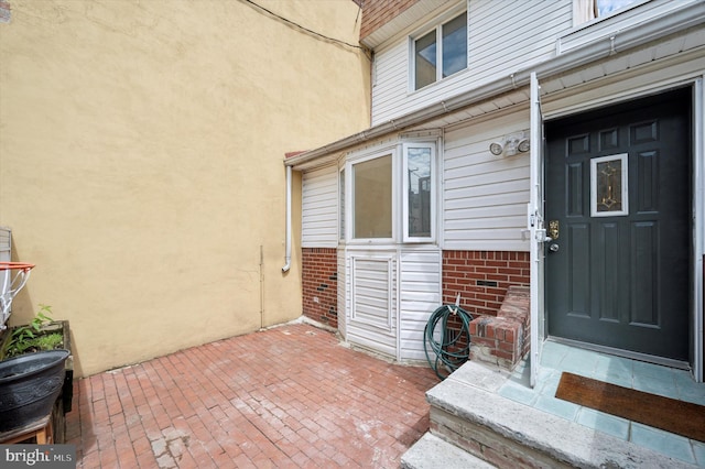 913 Tasker St, Philadelphia, PA 19148 - entrance to property featuring brick siding and stucco siding