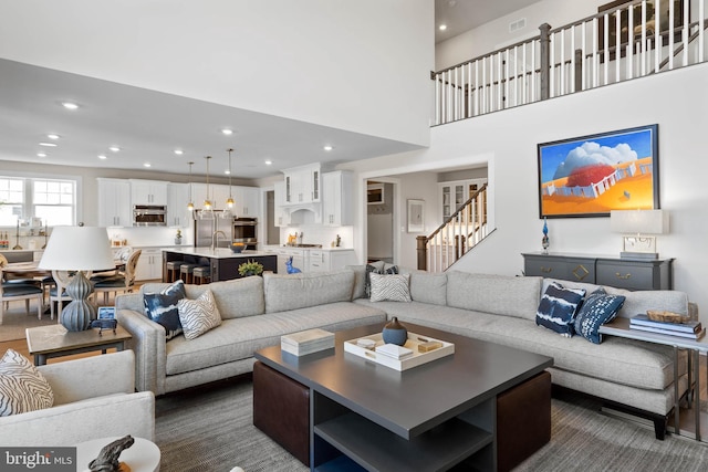 18234 Highwood Dr, Rehoboth Beach, DE 19971 - living area featuring recessed lighting and stairway