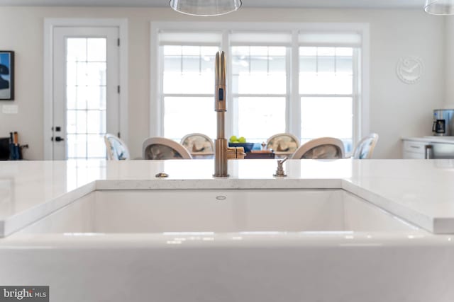 18234 Highwood Dr, Rehoboth Beach, DE 19971 - kitchen view of a sink and light countertops