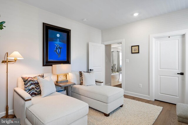 18234 Highwood Dr, Rehoboth Beach, DE 19971 - living area featuring wood finished floors, baseboards, and recessed lighting
