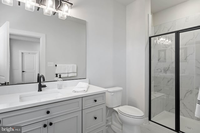 18234 Highwood Dr, Rehoboth Beach, DE 19971 - full bathroom with marble finish floors, vanity, a chandelier, a marble finish shower, and toilet