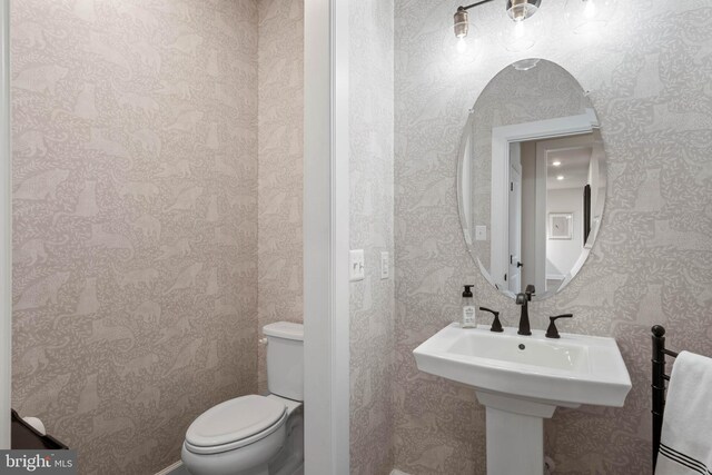 18234 Highwood Dr, Rehoboth Beach, DE 19971 - bathroom with toilet and wallpapered walls