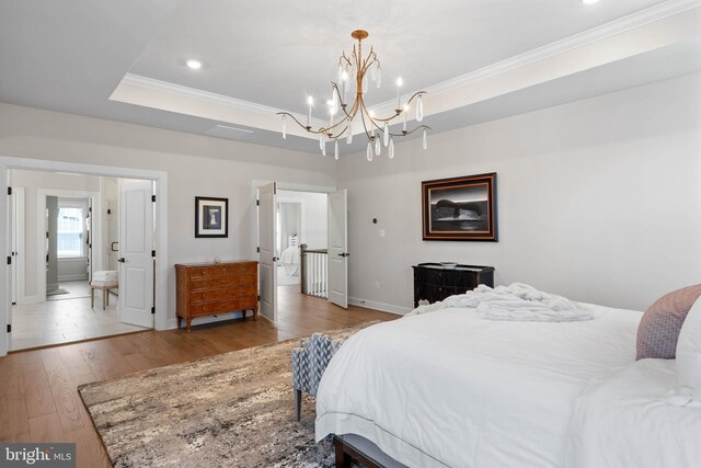 18234 Highwood Dr, Rehoboth Beach, DE 19971 - bedroom featuring a chandelier, ornamental molding, wood finished floors, baseboards, and recessed lighting