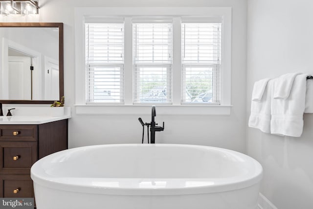 18234 Highwood Dr, Rehoboth Beach, DE 19971 - full bathroom featuring a freestanding bath and vanity