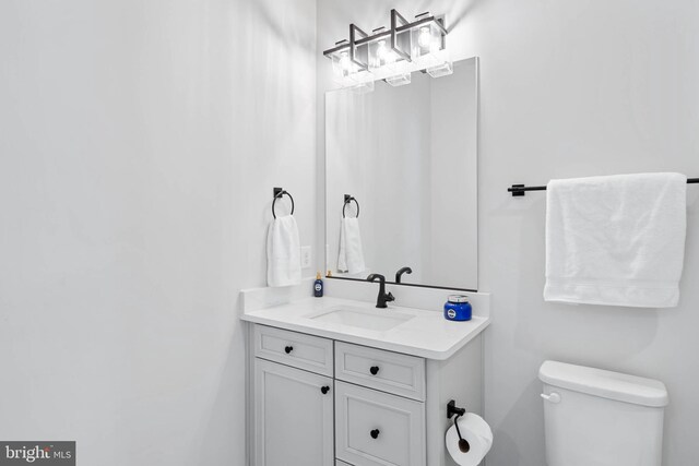 18234 Highwood Dr, Rehoboth Beach, DE 19971 - bathroom with vanity and toilet