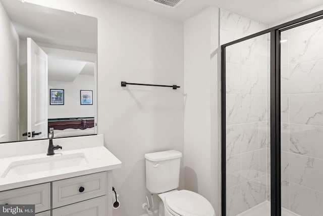 18234 Highwood Dr, Rehoboth Beach, DE 19971 - ensuite bathroom with vanity, a shower stall, and toilet