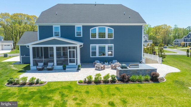 18234 Highwood Dr, Rehoboth Beach, DE 19971 - back of property with a patio area, a sunroom, a yard, and an outdoor living space with a fire pit