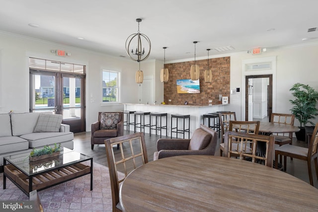 18234 Highwood Dr, Rehoboth Beach, DE 19971 - living area with french doors, ornamental molding, a chandelier, and wood finished floors