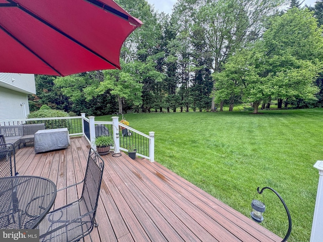 8328 Sand Cherry Ln, Laurel, MD 20723 - wooden deck featuring a yard and view of scattered trees