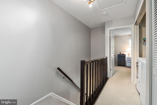 101 Pear Tree Ln, Franklin Park, NJ 08823 - corridor with an upstairs landing, light colored carpet, and baseboards