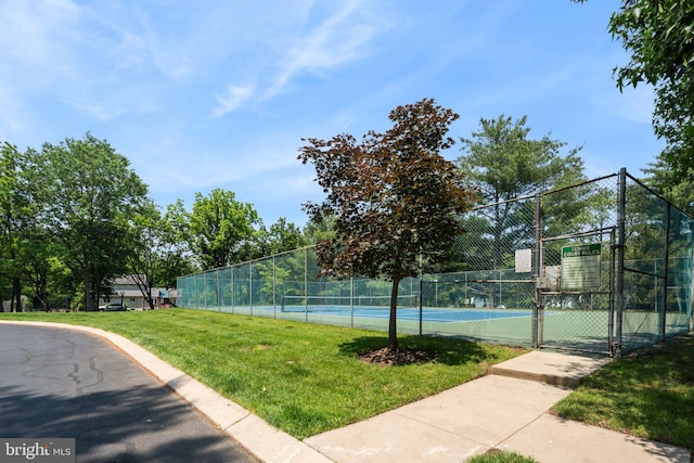 101 Pear Tree Ln, Franklin Park, NJ 08823 - view of tennis court featuring a gate