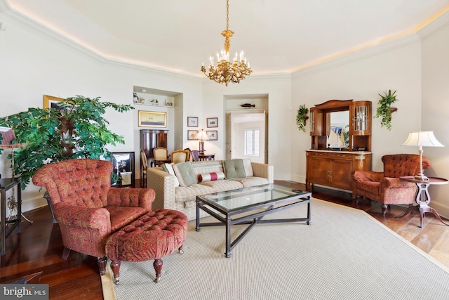 9791 Pintail Pl, Saint Michaels, MD 21663 - living area with a chandelier, wood finished floors, ornamental molding, and baseboards
