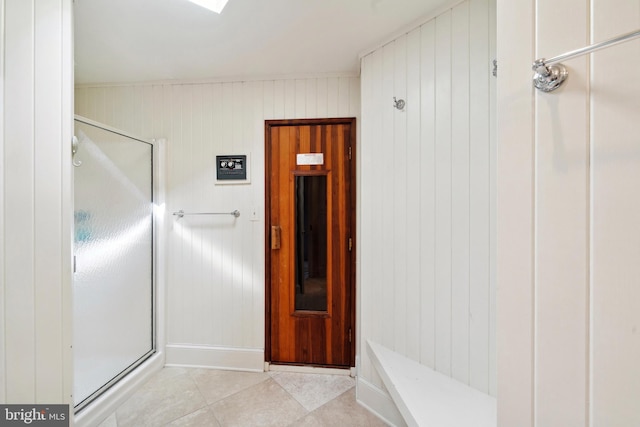9791 Pintail Pl, Saint Michaels, MD 21663 - full bath featuring a stall shower, tile patterned flooring, and baseboards
