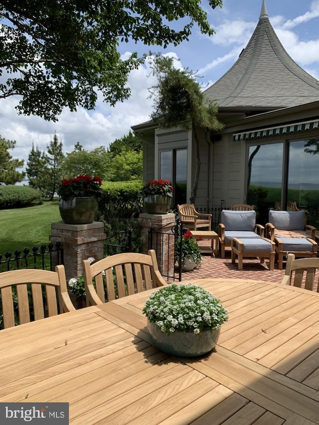 9791 Pintail Pl, Saint Michaels, MD 21663 - wooden terrace with a lawn