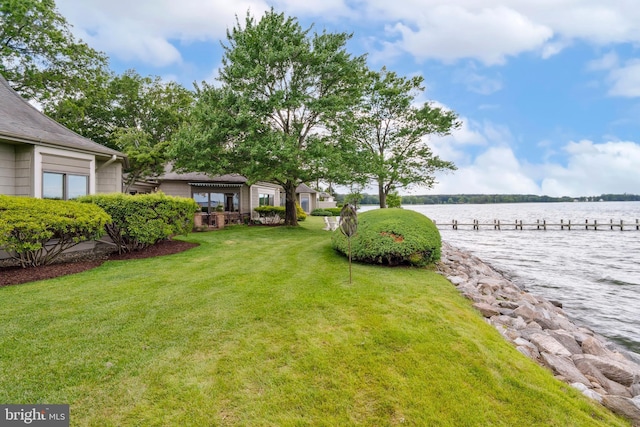 9791 Pintail Pl, Saint Michaels, MD 21663 - view of green lawn featuring a water view and a boat dock