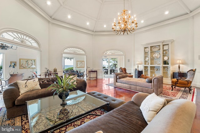 9791 Pintail Pl, Saint Michaels, MD 21663 - living room featuring coffered ceiling, a towering ceiling, a chandelier, recessed lighting, and wood finished floors