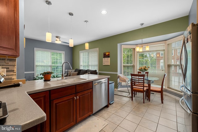 4000 Timber Oak Trl, Fairfax, VA 22033 - kitchen featuring a sink, stainless steel appliances, healthy amount of natural light, light tile patterned flooring, and recessed lighting