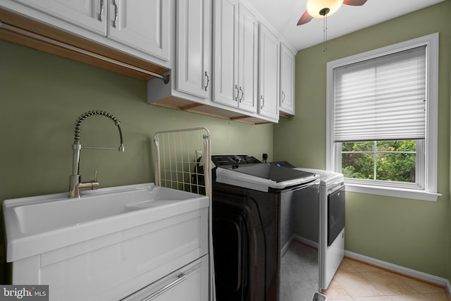 4000 Timber Oak Trl, Fairfax, VA 22033 - laundry area featuring separate washer and dryer, cabinet space, a ceiling fan, baseboards, and light tile patterned flooring