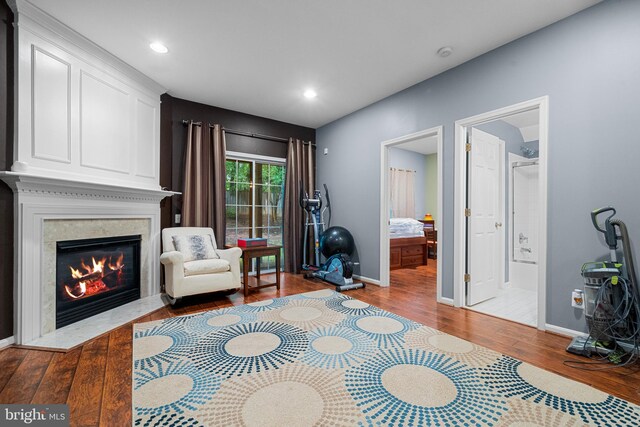 4000 Timber Oak Trl, Fairfax, VA 22033 - living area featuring wood finished floors, baseboards, a high end fireplace, and recessed lighting