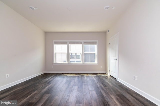 13039 Hattontown Sq, Herndon, VA 20171 - spare room featuring dark wood finished floors and baseboards