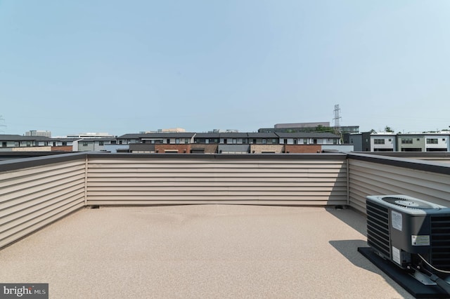 13039 Hattontown Sq, Herndon, VA 20171 - view of patio with central AC unit and a balcony