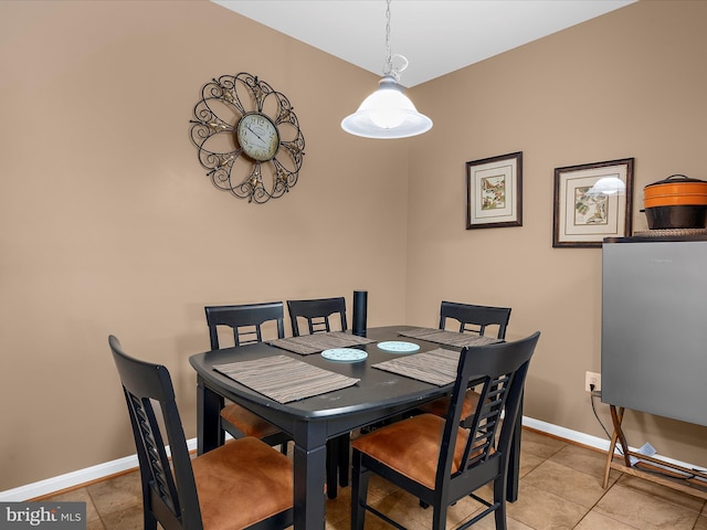 900 Marshy Cv Unit 111, Cambridge, MD 21613 - dining room with baseboards and light tile patterned flooring