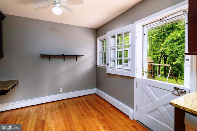 2410 Huntingdon Rd, Huntingdon Valley, PA 19006 - doorway to outside featuring baseboards, healthy amount of natural light, ceiling fan, and light wood-style floors