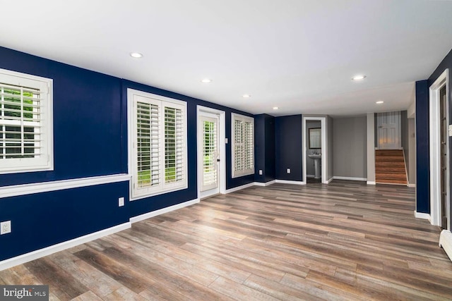 2410 Huntingdon Rd, Huntingdon Valley, PA 19006 - unfurnished living room featuring wood finished floors, stairs, recessed lighting, and baseboards