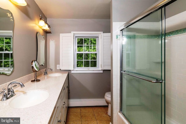 2410 Huntingdon Rd, Huntingdon Valley, PA 19006 - full bathroom featuring a baseboard radiator, healthy amount of natural light, double vanity, and an enclosed shower