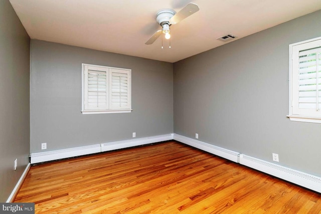 2410 Huntingdon Rd, Huntingdon Valley, PA 19006 - empty room featuring wood finished floors, a ceiling fan, and baseboards