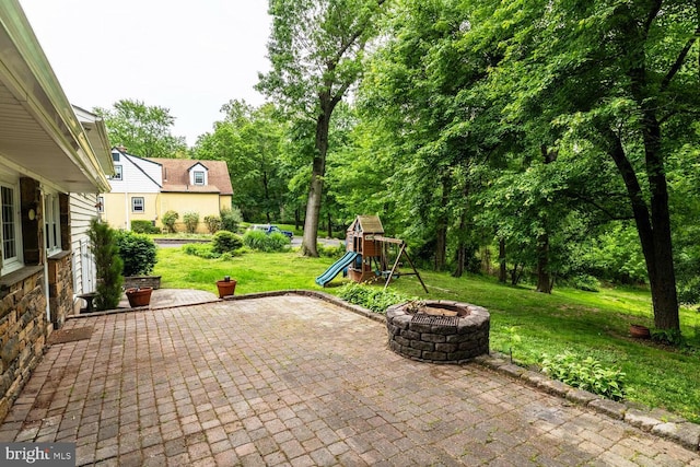 2410 Huntingdon Rd, Huntingdon Valley, PA 19006 - view of patio / terrace with a playground and an outdoor fire pit