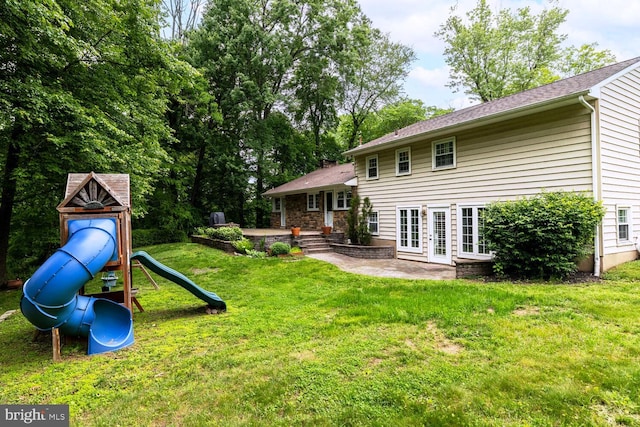 2410 Huntingdon Rd, Huntingdon Valley, PA 19006 - back of property featuring a patio, a yard, french doors, and a playground