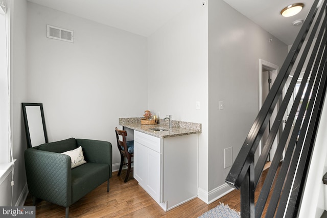 2117 Latona St, Philadelphia, PA 19146 - living area featuring baseboards and light wood-style flooring