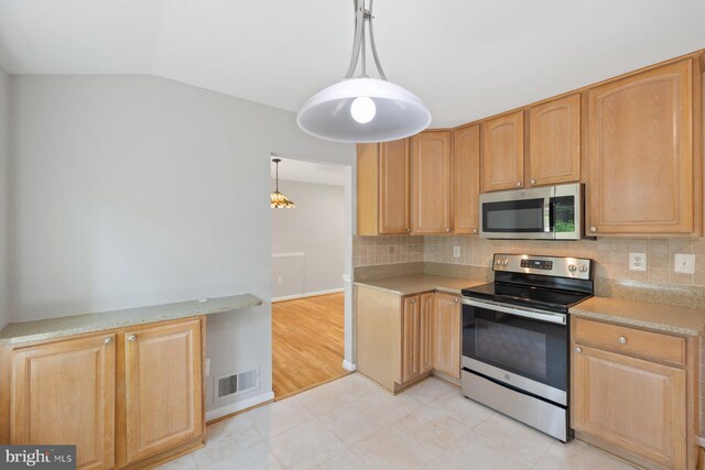 1515 Ainsley Rd, Silver Spring, MD 20904 - kitchen with appliances with stainless steel finishes, decorative backsplash, light countertops, light brown cabinets, and vaulted ceiling