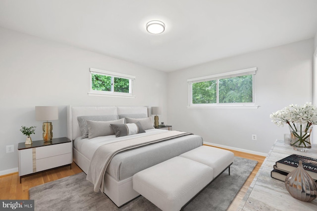 1515 Ainsley Rd, Silver Spring, MD 20904 - bedroom with multiple windows, baseboards, and wood finished floors