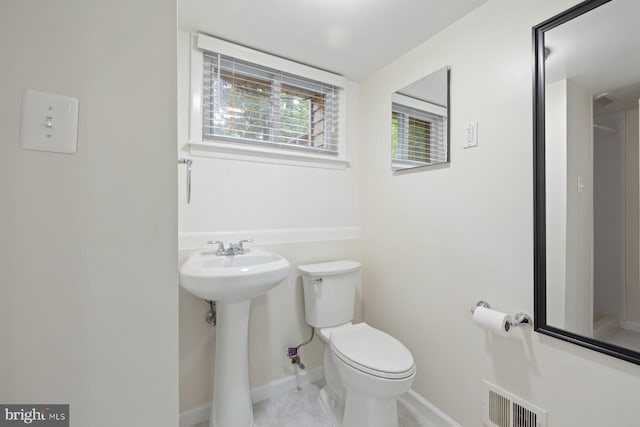 1515 Ainsley Rd, Silver Spring, MD 20904 - bathroom with toilet, baseboards, a sink, and tile patterned floors